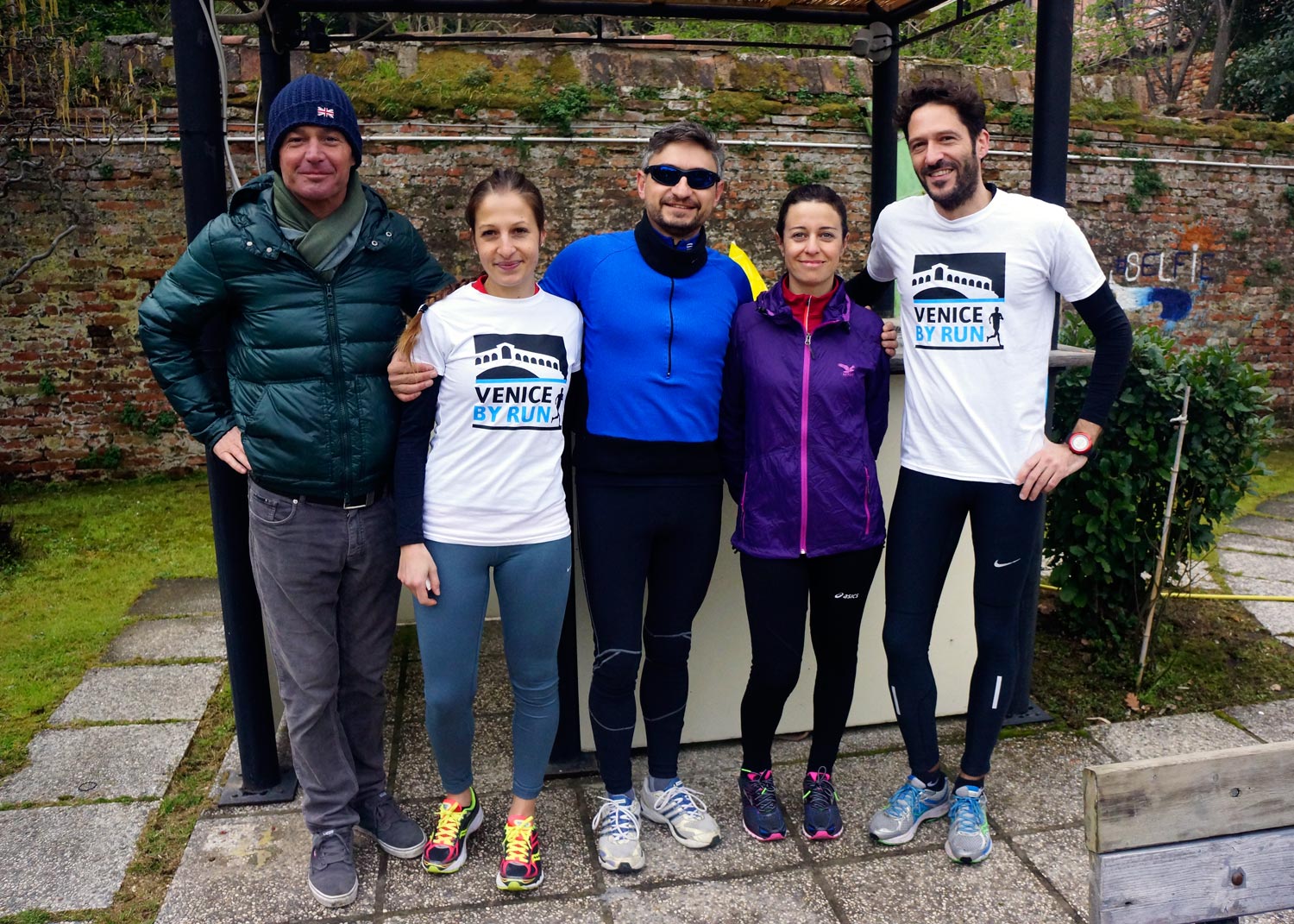 Runners and host in Cantieri Biasin in Venice