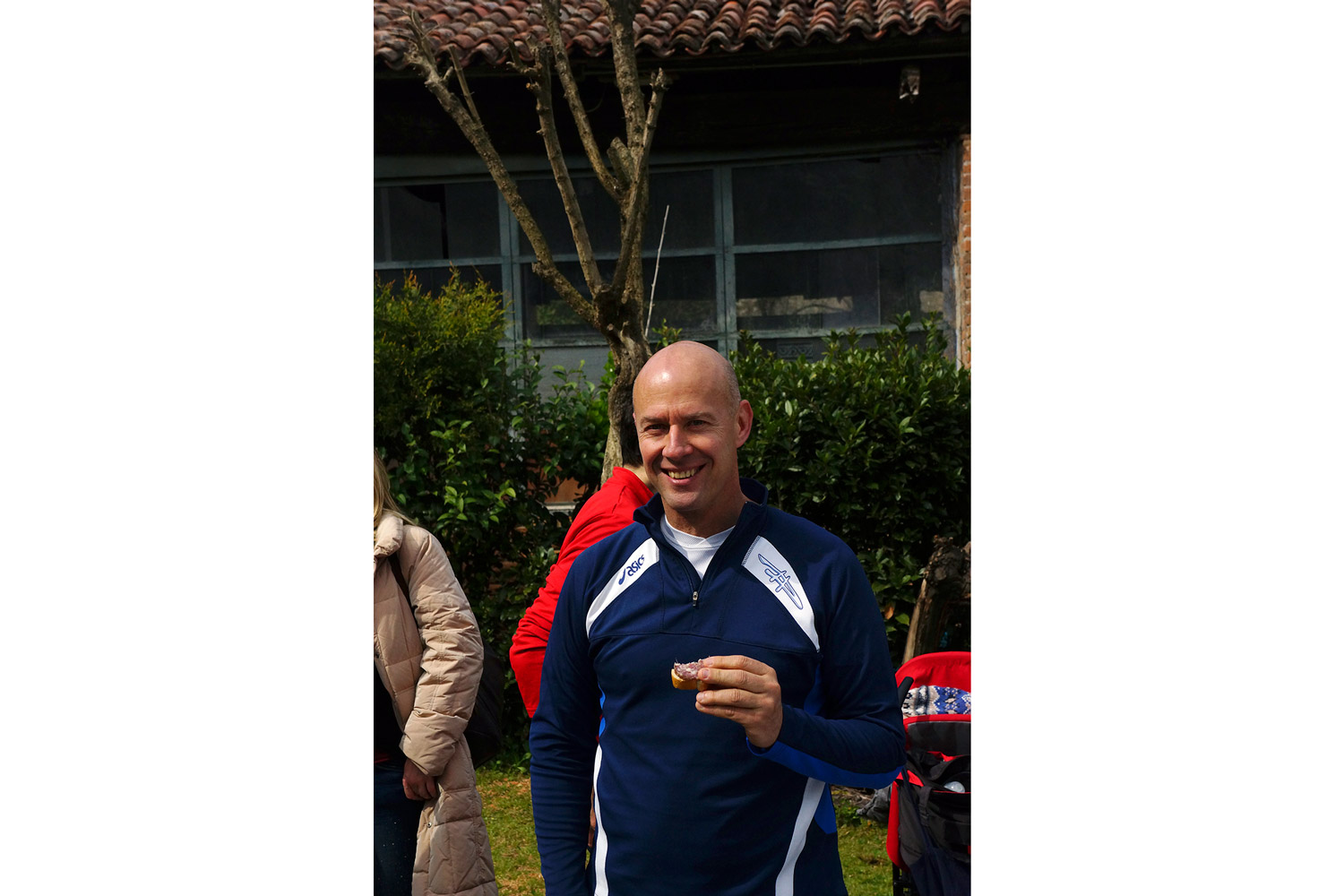 Runner drinking red wine in Venice after the run