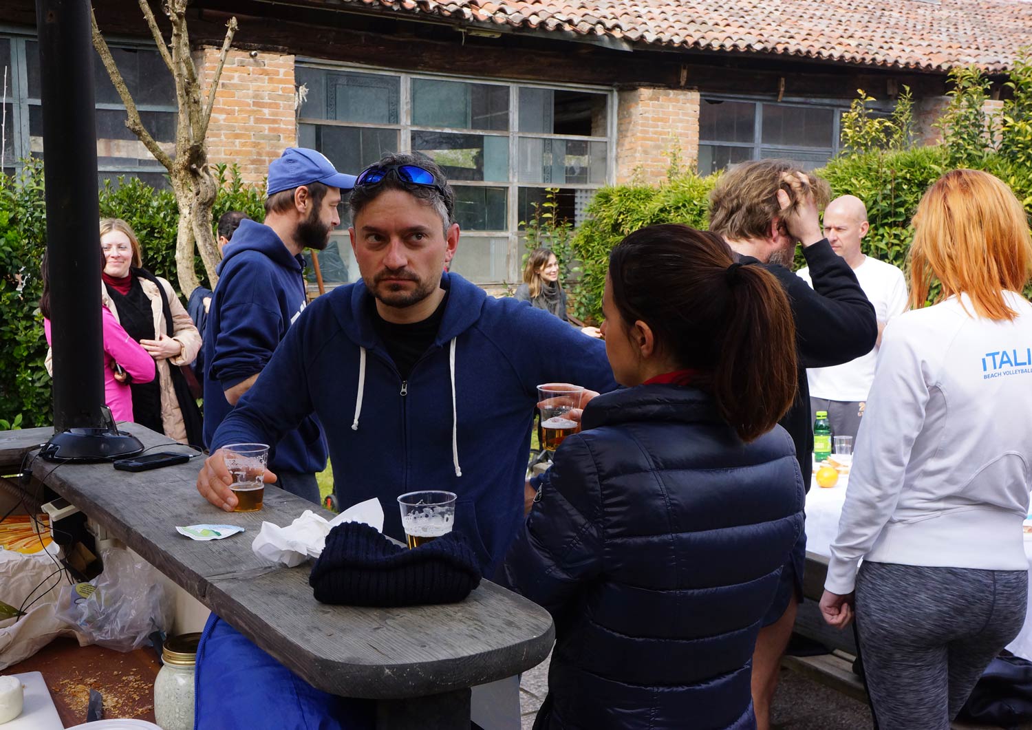 Runners chatting at the bar after the run