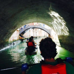Kayaking under the bridge in Venice